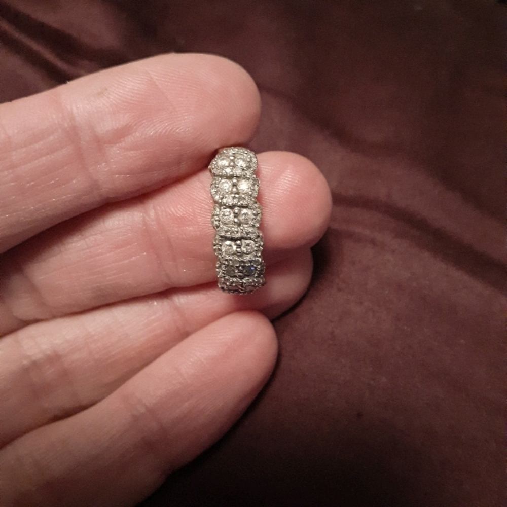 A size 7 diamond and ruby and diamond in rose